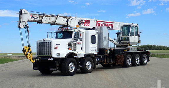 2008 Manitowoc Crawler Crane 2015 Kenworth C500 boom truck sold at Ritchie Bros.