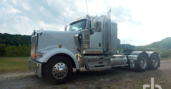 Caterpillar Motor Grader Transport trucks for sale at Ritchie Bros.