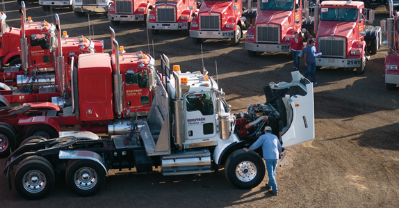 Truck tractors waiting to be sold at our equipment and truck auction